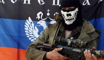 Боевик «ДНР» с гранатой и оружием пытался ограбить магазин