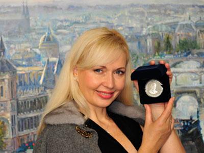 Татьяна Левераш-Пономаренко с президентской медалью.
