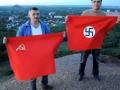 В Донецке шахтеры сожгли фашистский и большевистский флаги (ВИДЕО)